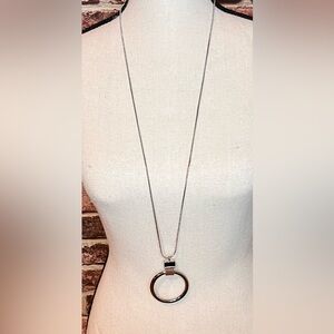 Long silver chain with brown and crystal ring. WHBM